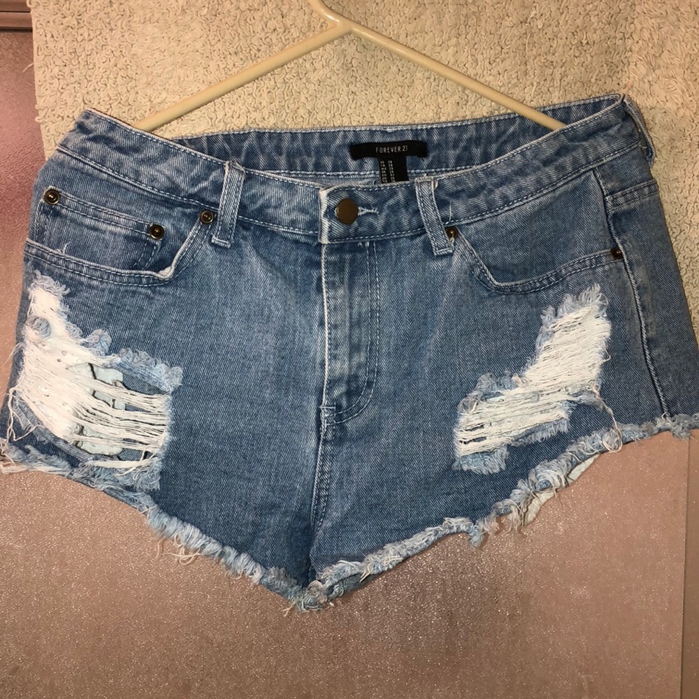 Medium washed distressed denim jeans